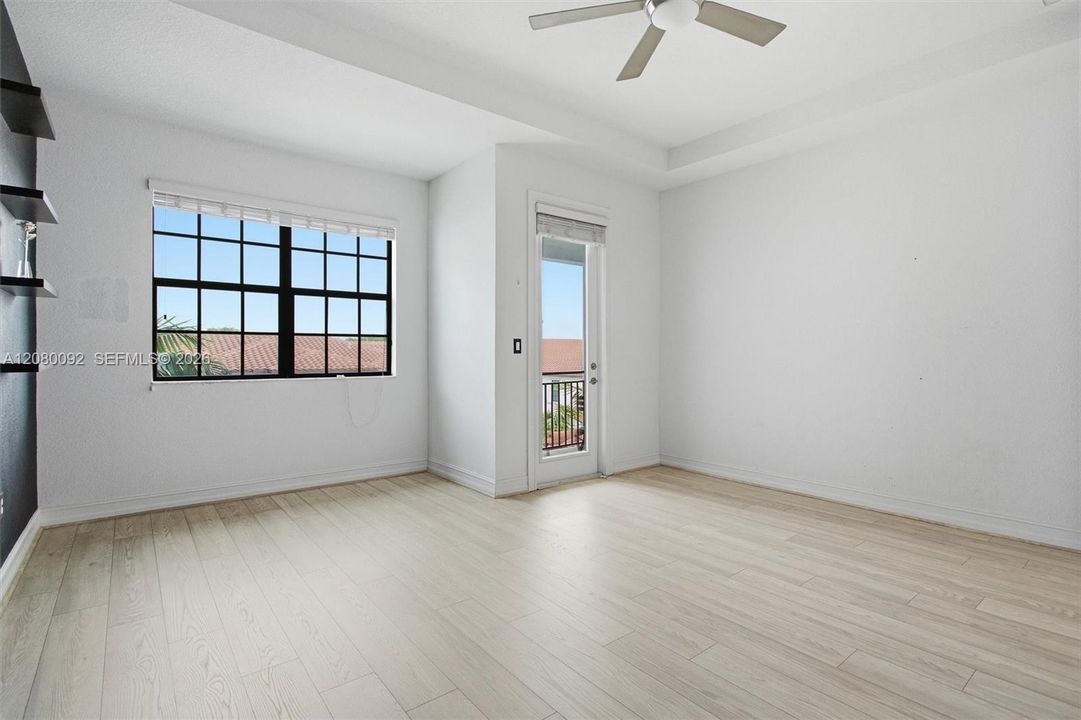 Master Bedroom - Notice New Laminate Floors & Ceiling Fan