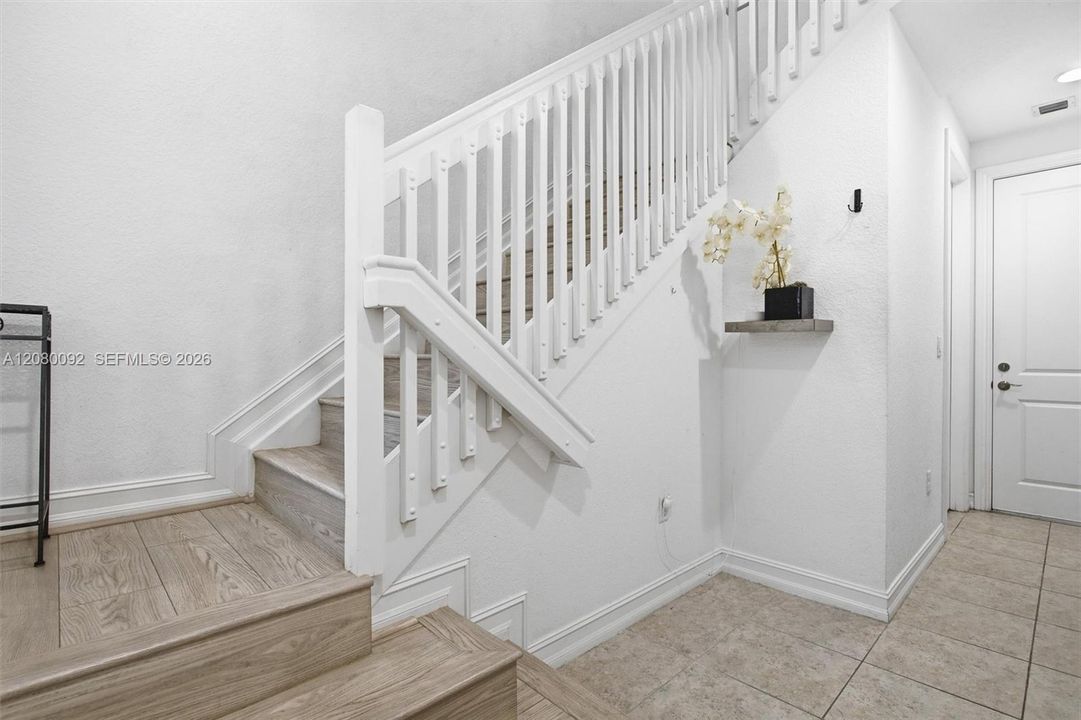 Newly Laminated Stairway to Second Floor