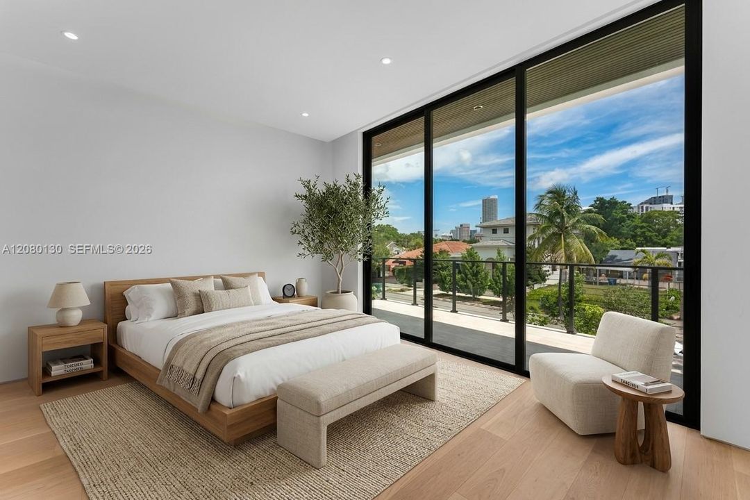 Guest Bedroom. Disclaimer: Several photographs presented in this listing contain digitally added furniture, artwork, and decor. These virtually staged images are intended solely for illustrative purposes.