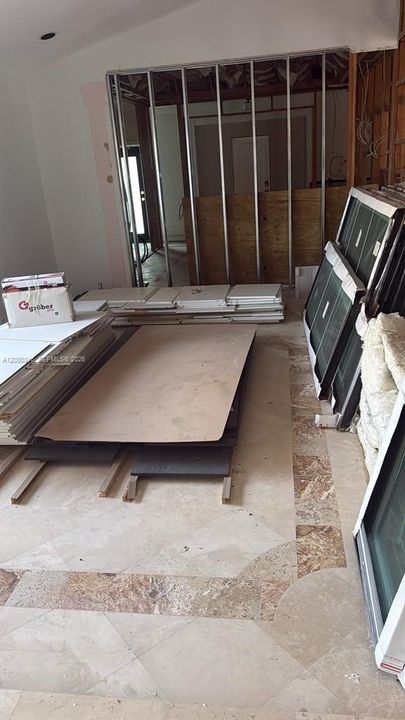 Cabinets, countertops and impact windows