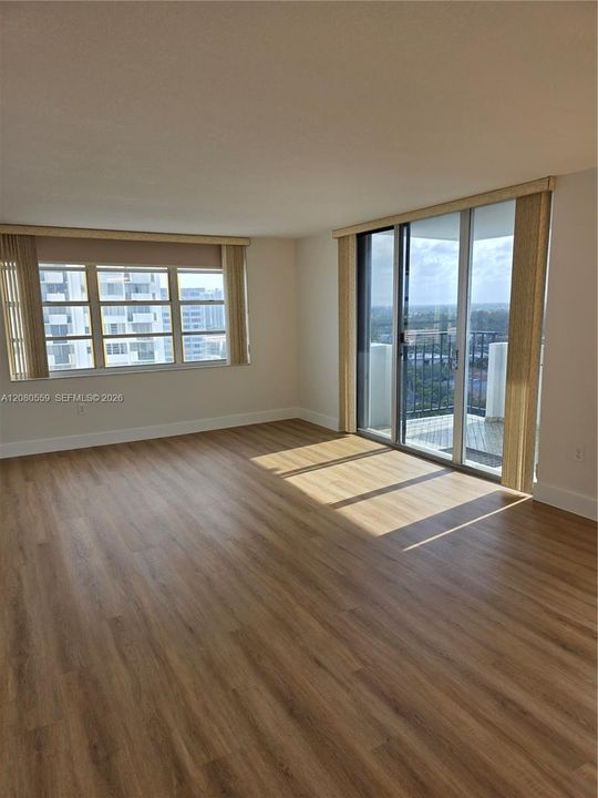BRAND NEW FLOORING IN LIVING / DINING AREA