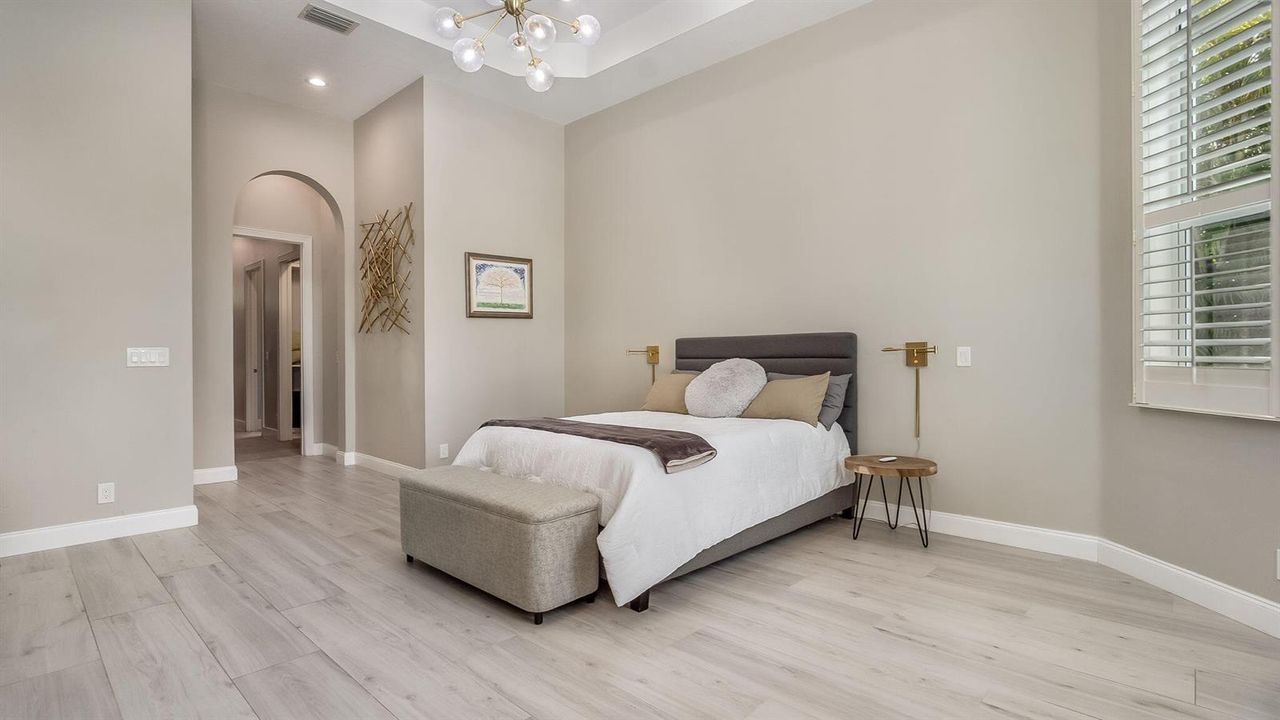 Primary Bedroom with vaulted ceiling