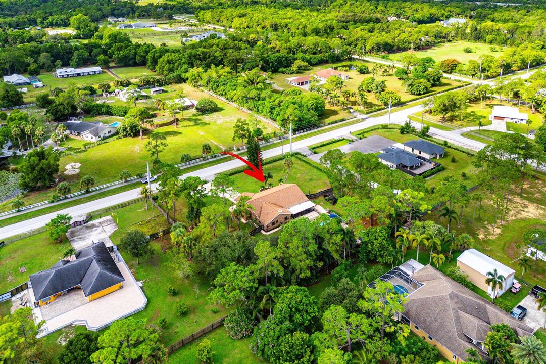 052-18429SycamoreDriveWest-TheAcreage-FL