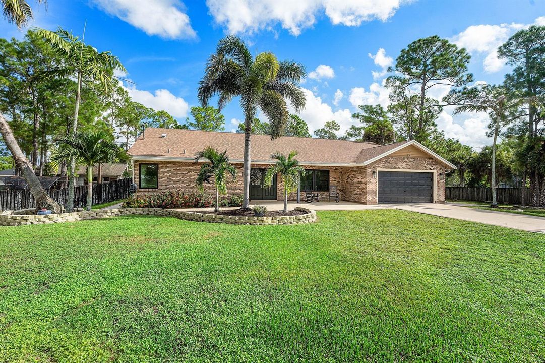 003-18429SycamoreDriveWest-TheAcreage-FL