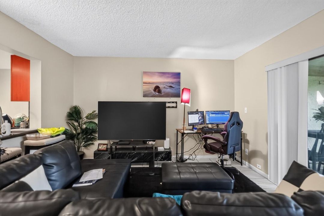 10_3254_N_Pine_Island_Rd-Living_room-006