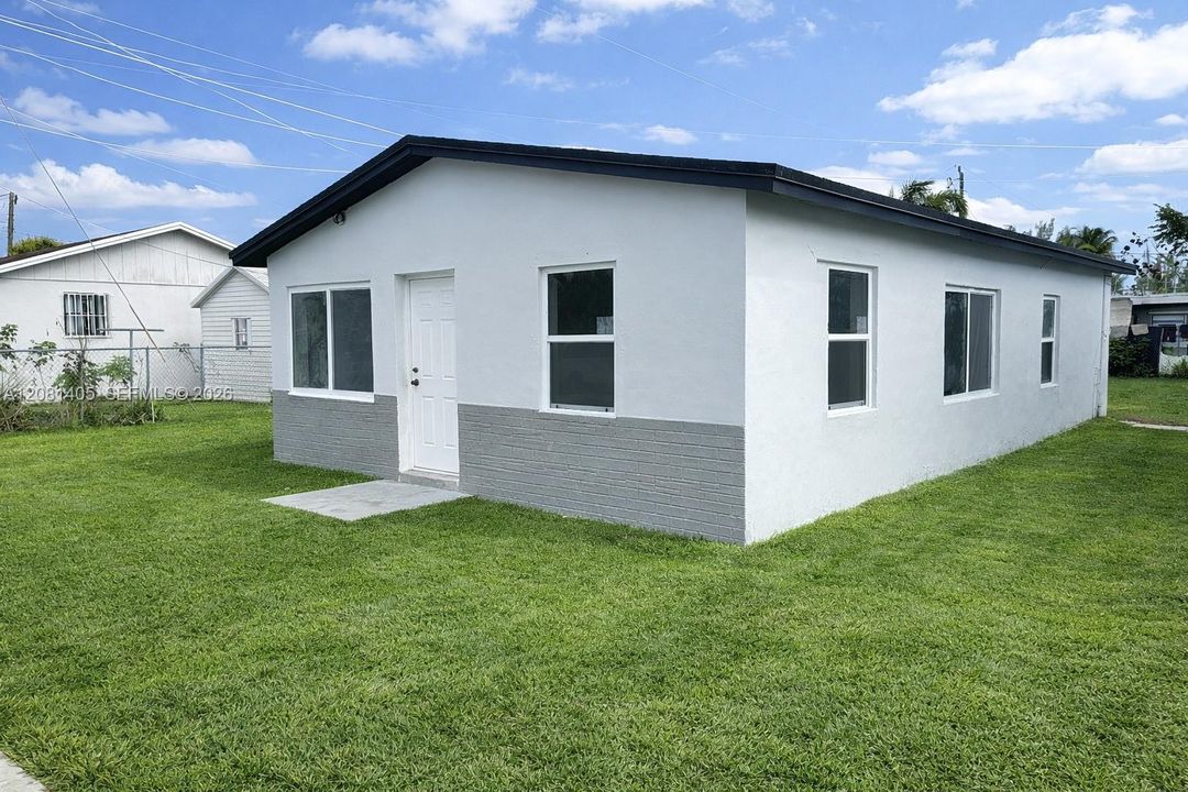 Front exterior with off-street parking