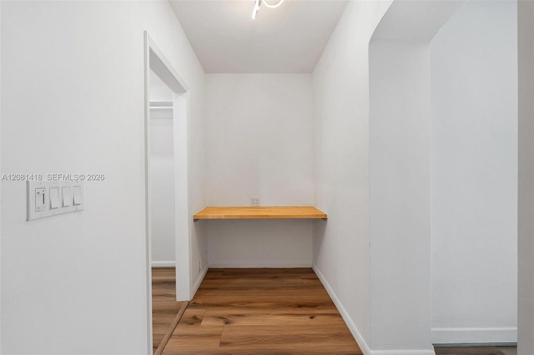 Main-level primary suite dedicated office nook