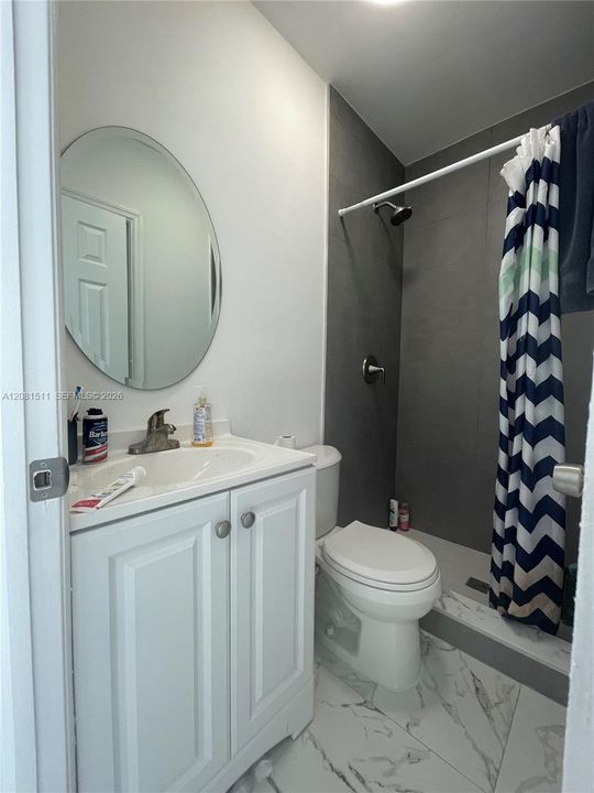 Full bathroom with tub