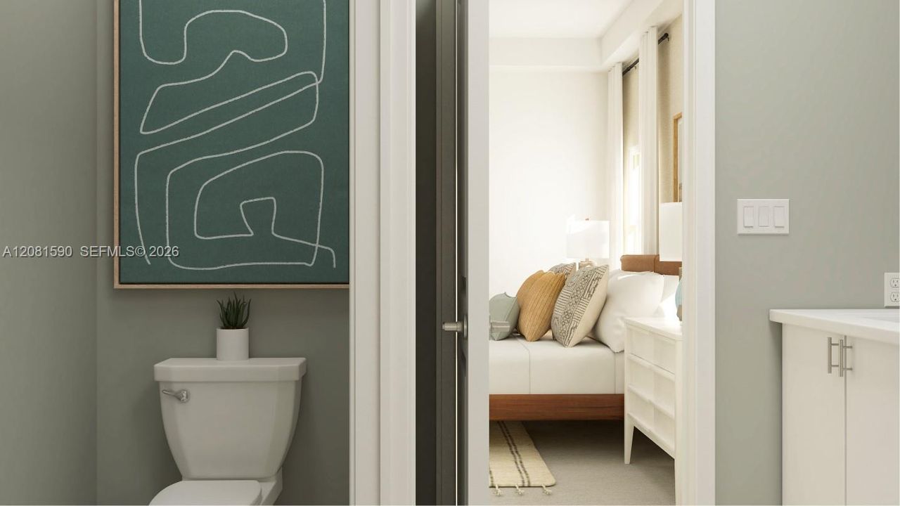 Enjoy easy access to the en-suite bathroom from the owner’s suite.