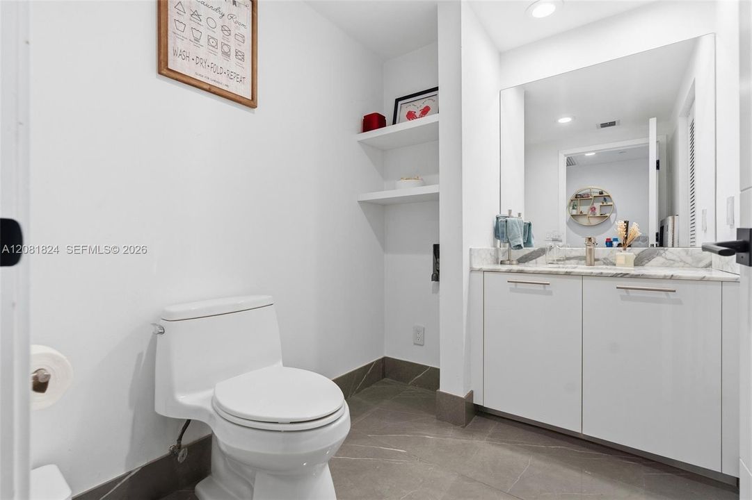 Half Bath for your guests right by the Entry