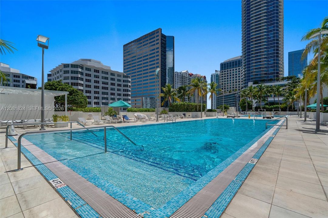Two Resort Style Pools with Jacuzzi and BBQ area