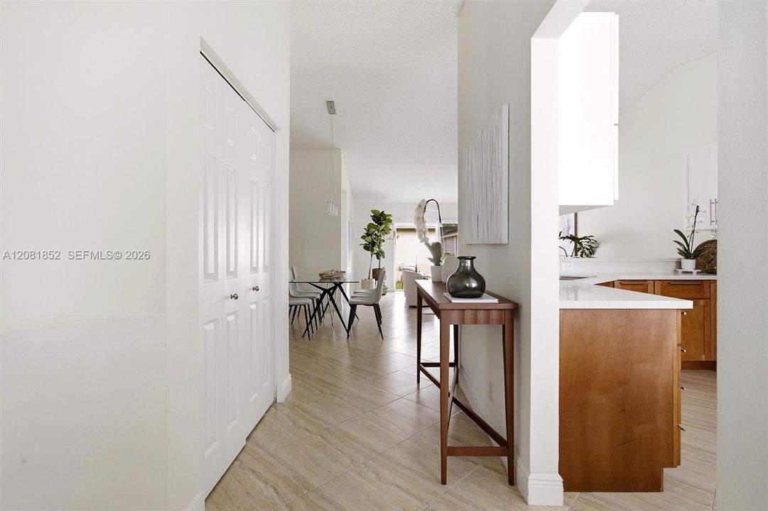 Welcoming foyer with elegant console table sets the tone for the home.