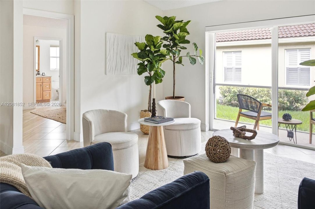 Open living space perfect for entertaining, with serene outdoor views.