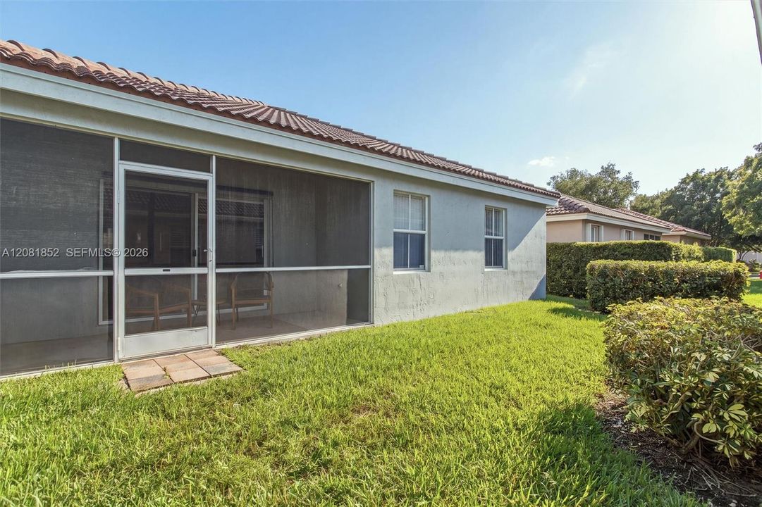 Private, screened backyard offering a peaceful outdoor retreat.