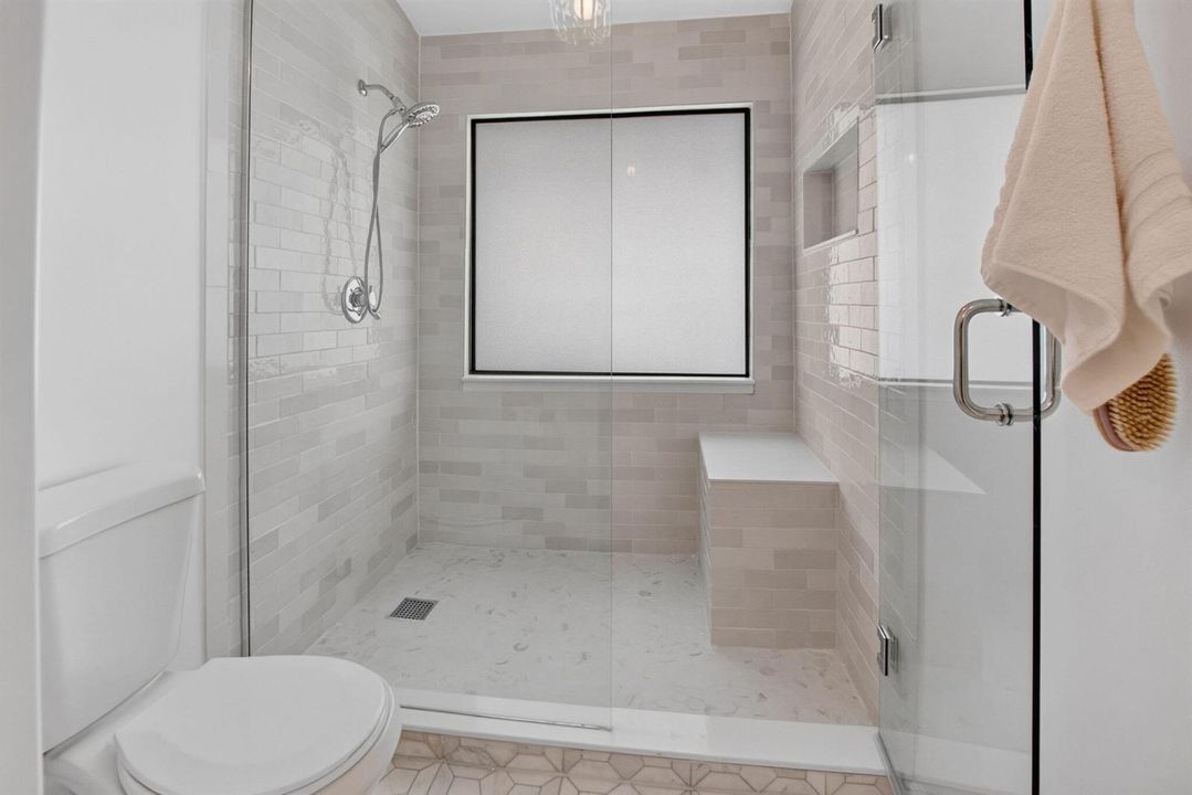 CUSTOM MARBLE FLOOR TO CEILING SHOWER