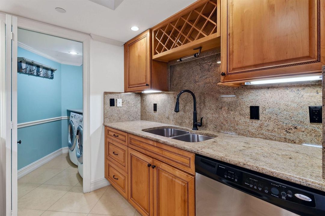 Kitchen with indoor Laundry Room