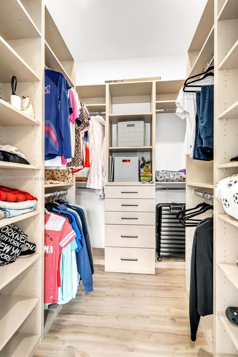 upstairs bedroom walk-in closet