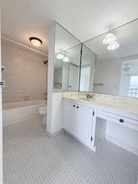Primary bathroom with bathtub.