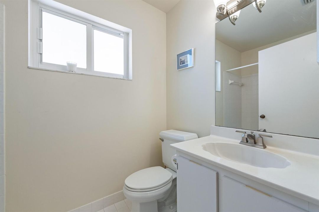 bathroom toilet near laundry