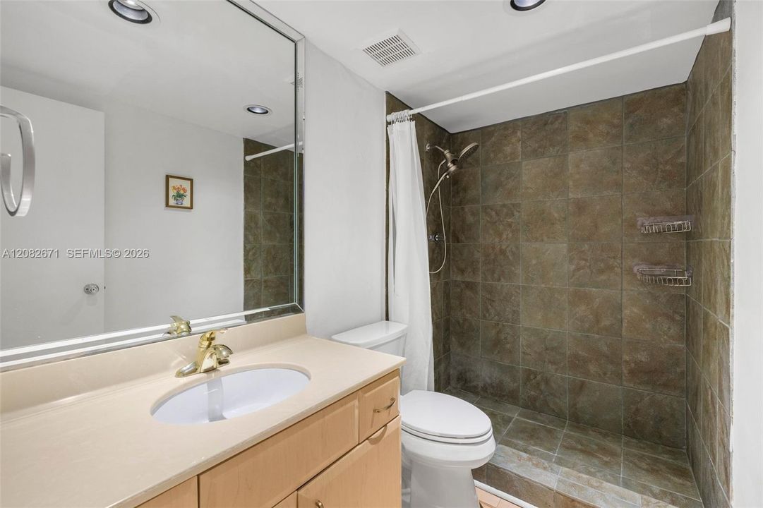 Primary bath with soaking tub and shower.