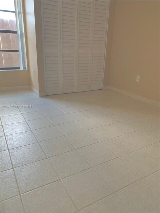 1 of 2: Photographs depicting the third bedroom.