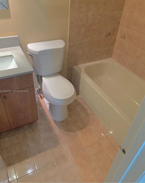1 of 2: Image depicting the hall bathroom.