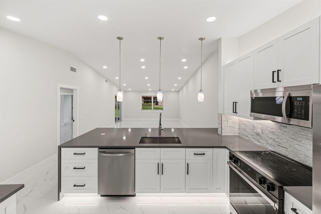 1 Kitchen - Back to Laundry Room