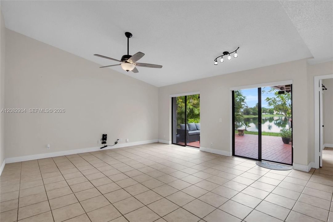 living-dining area open to back patio