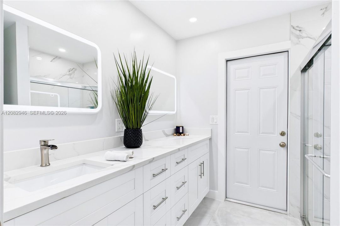 The beautifully RENOVATED POOL BATHROOM offers convenient access from the outdoor living area, perfect for future pool days & entertaining.