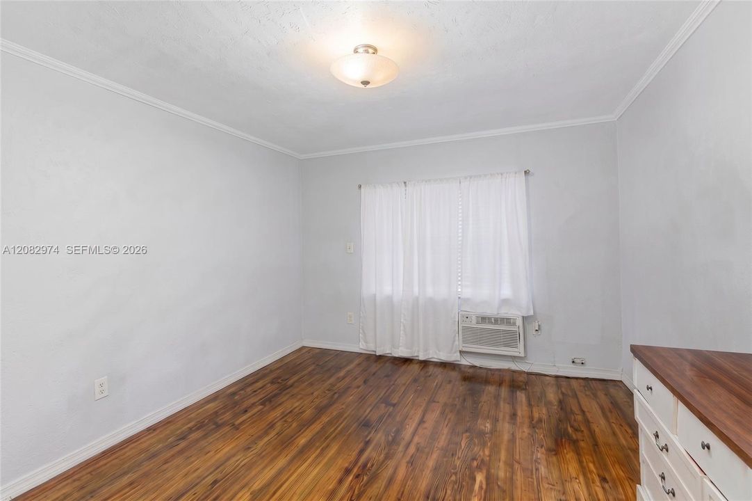 AI-Modified Image. Furniture digitally removed