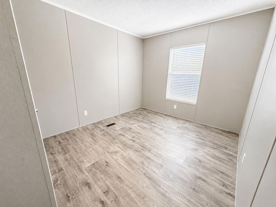 Sunlit Minimalist Neutral Bedroom