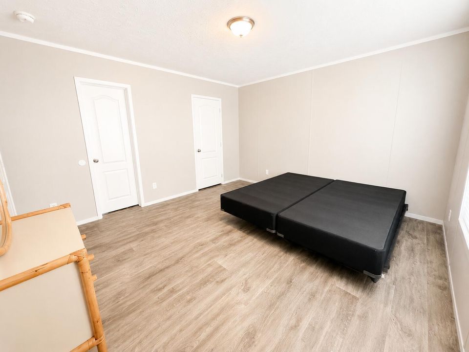 Minimalist Bedroom with Black Platform B