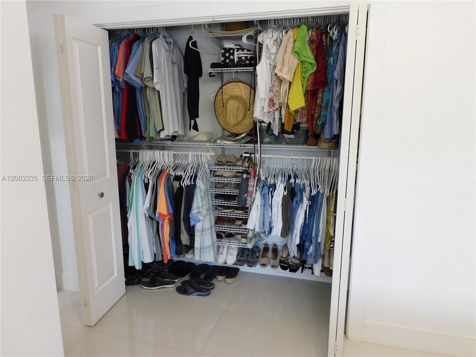Primary Bedroom with Closet Organizer System.
