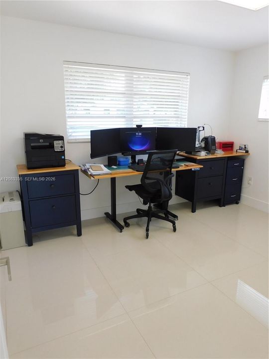 Spacious 2nd Bedroom currently been used as an office work space.