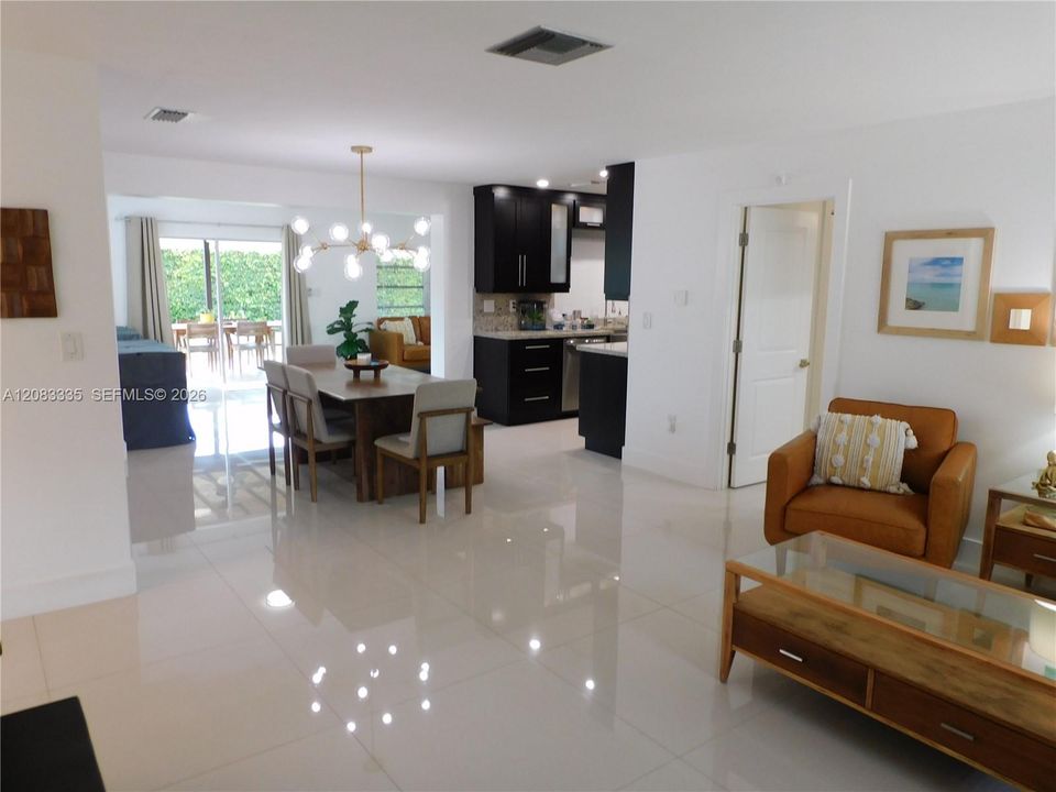 Once you enter your are greeted by 36 x36 Porcelain Tiles and an Abundance of Natural Light.