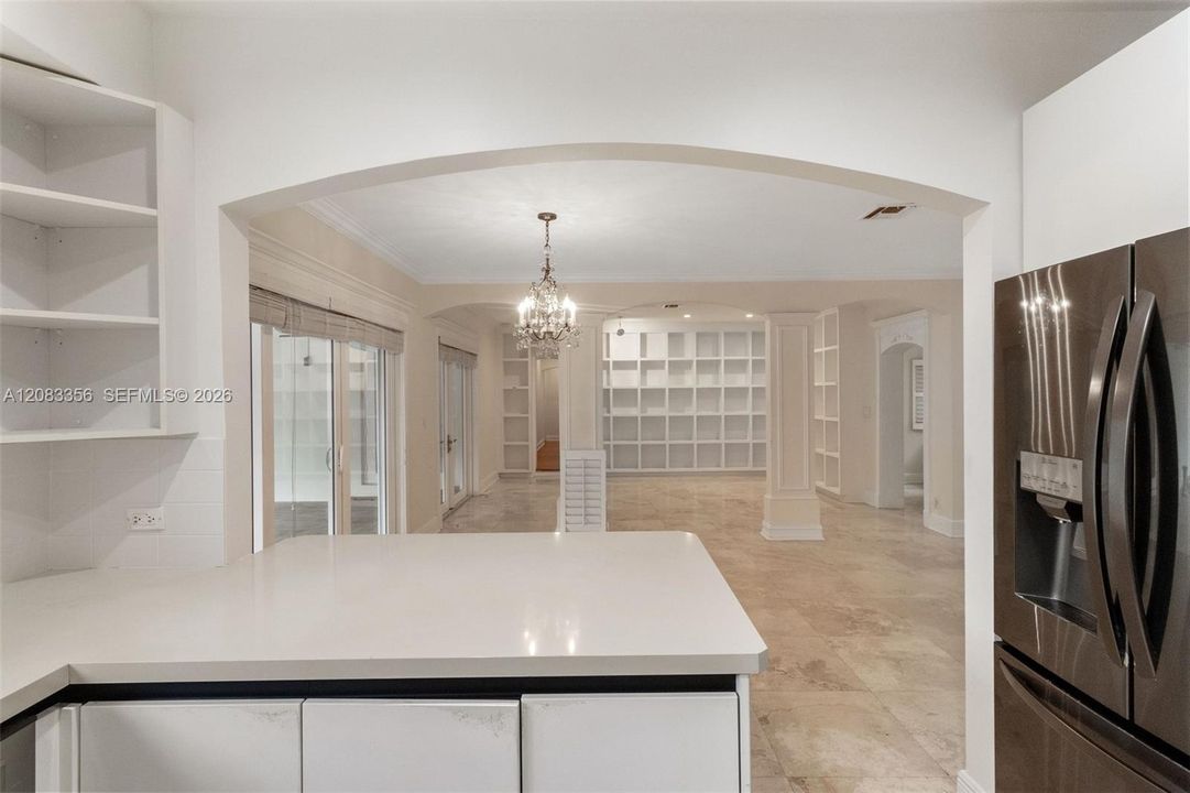 Open Kitchen Leads to Living, Family and Dining Room Areas