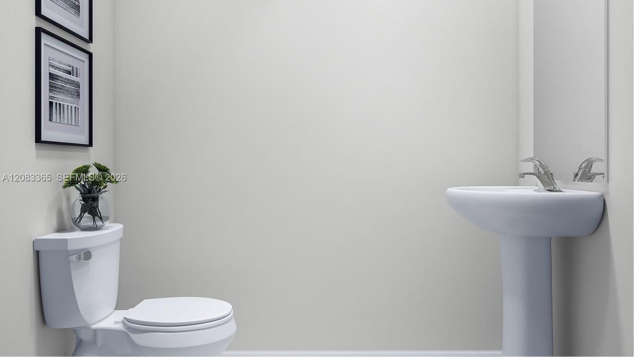 Located behind the family room is a convenient powder room to readily meet the needs of the whole household and visiting guests alike.