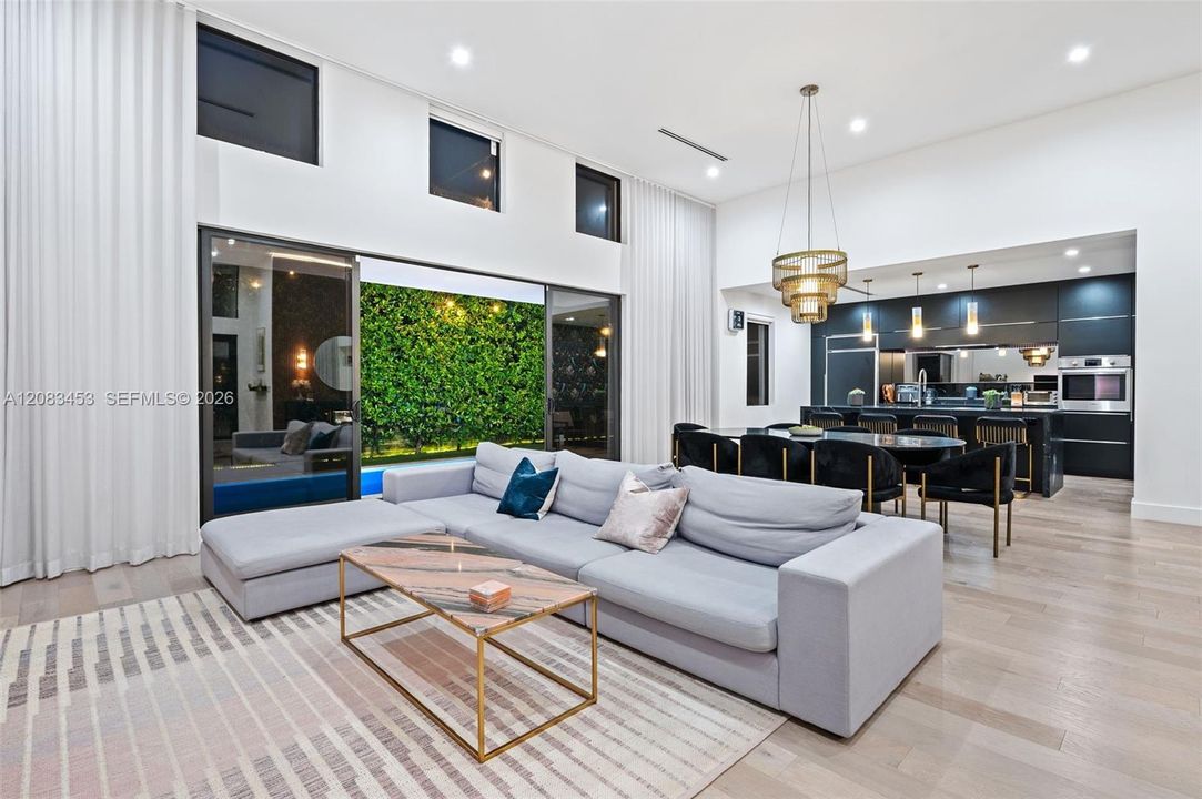 Spacious open floor plan with impact glass & luxury automated shades.