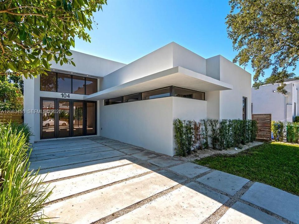 Wide driveway and ample parking on the road as well!