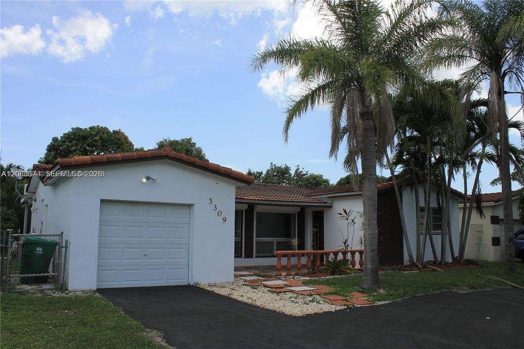 Tile Roof and Solar Panels! Circular Driveway with Parking for 6-8 Cars!