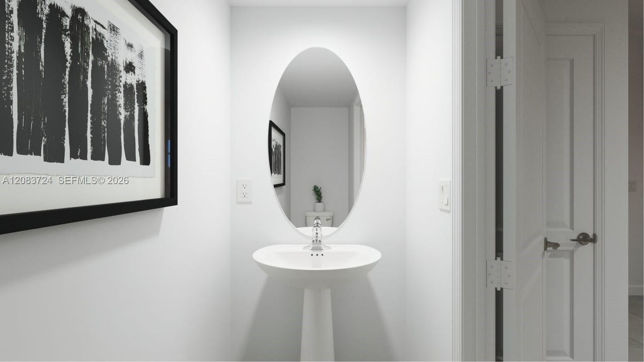 Located at the center of the first floor, this powder room can be readily accessed from the main living areas to meet the needs of the whole family.