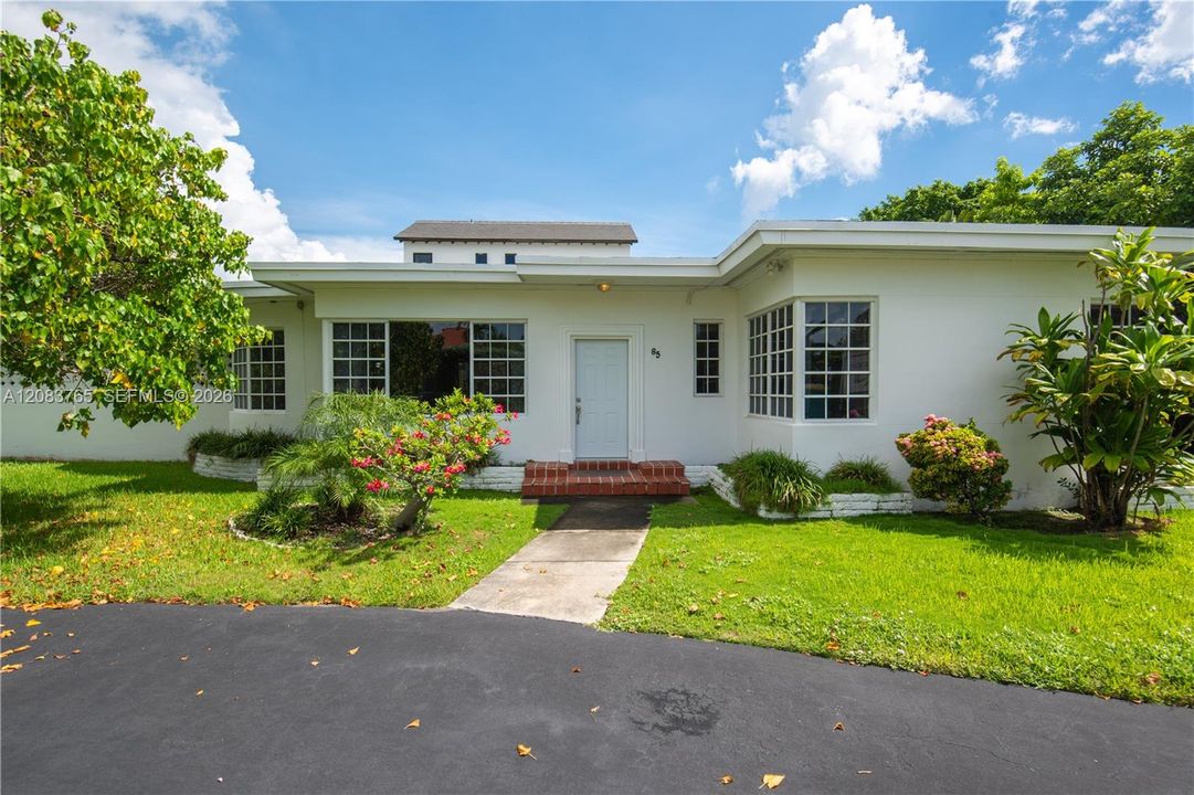 Front of House - Circular Driveway Visible