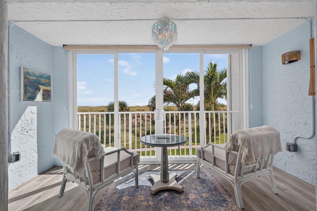BALCONY OFF LIVING ROOM WITH OCEAN VIEWS