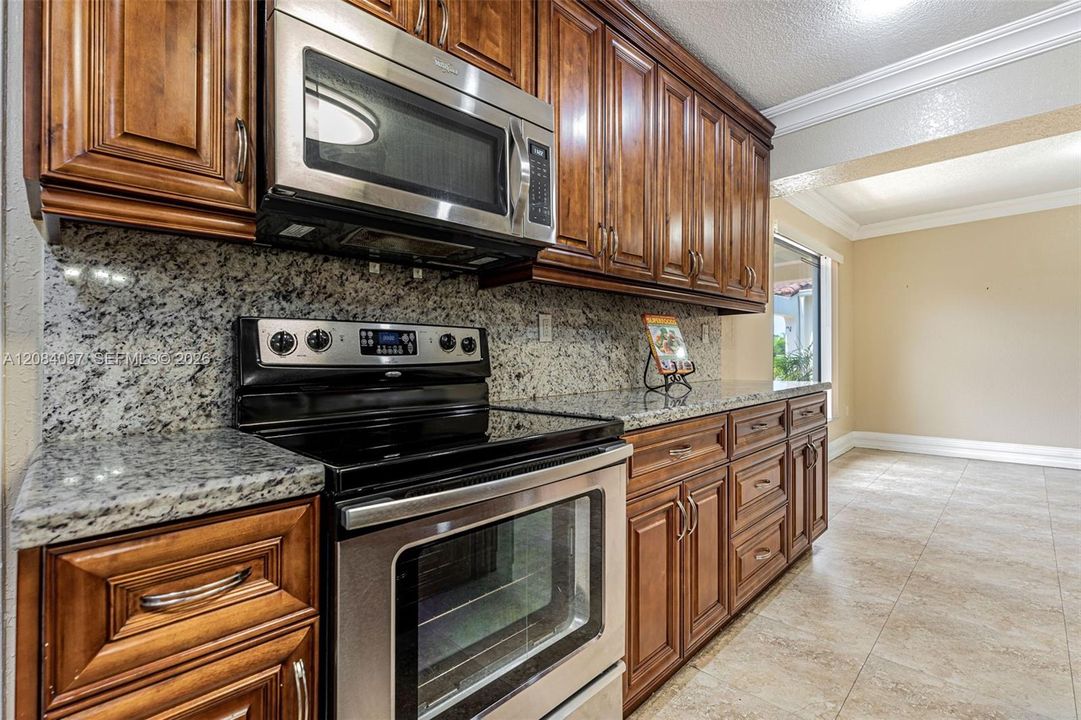Granite counters and wood cabinets
