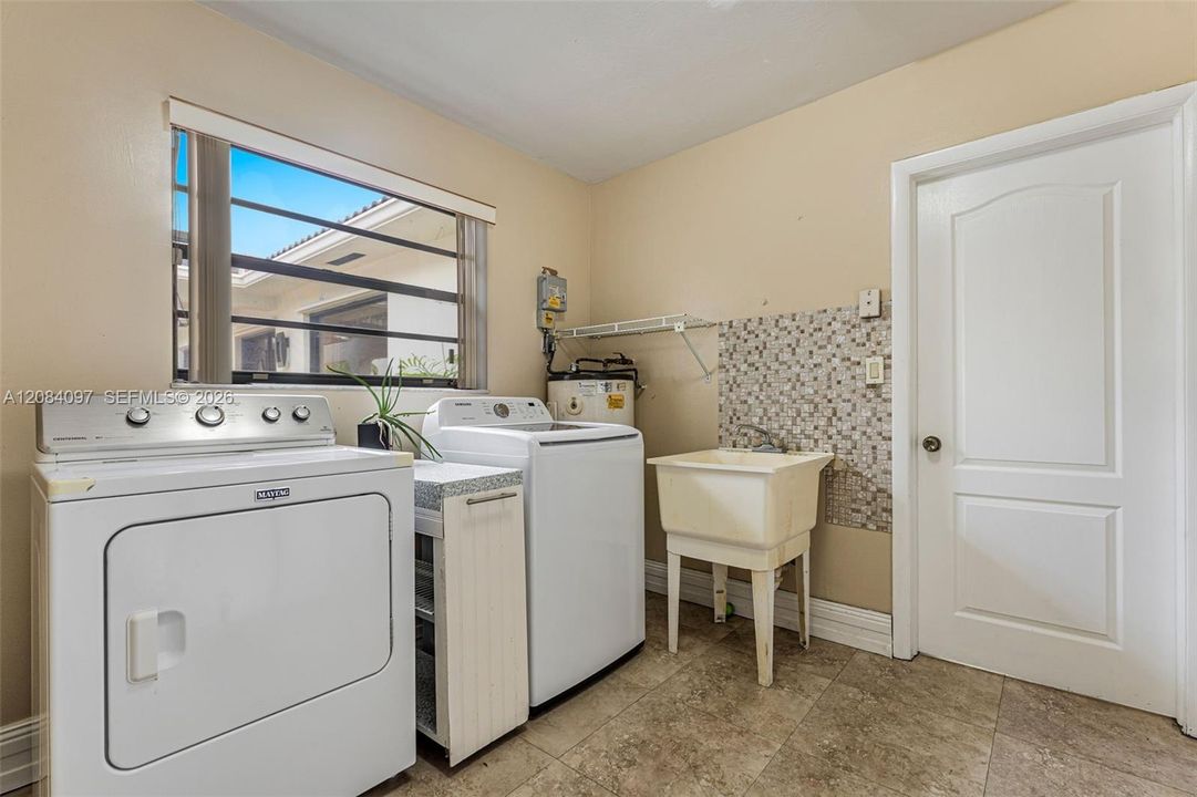 Laundry room with storage THIS IS NOT in the garage
