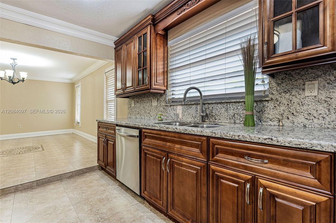 Kitchen overlooking 2nd dining area or formal dining room