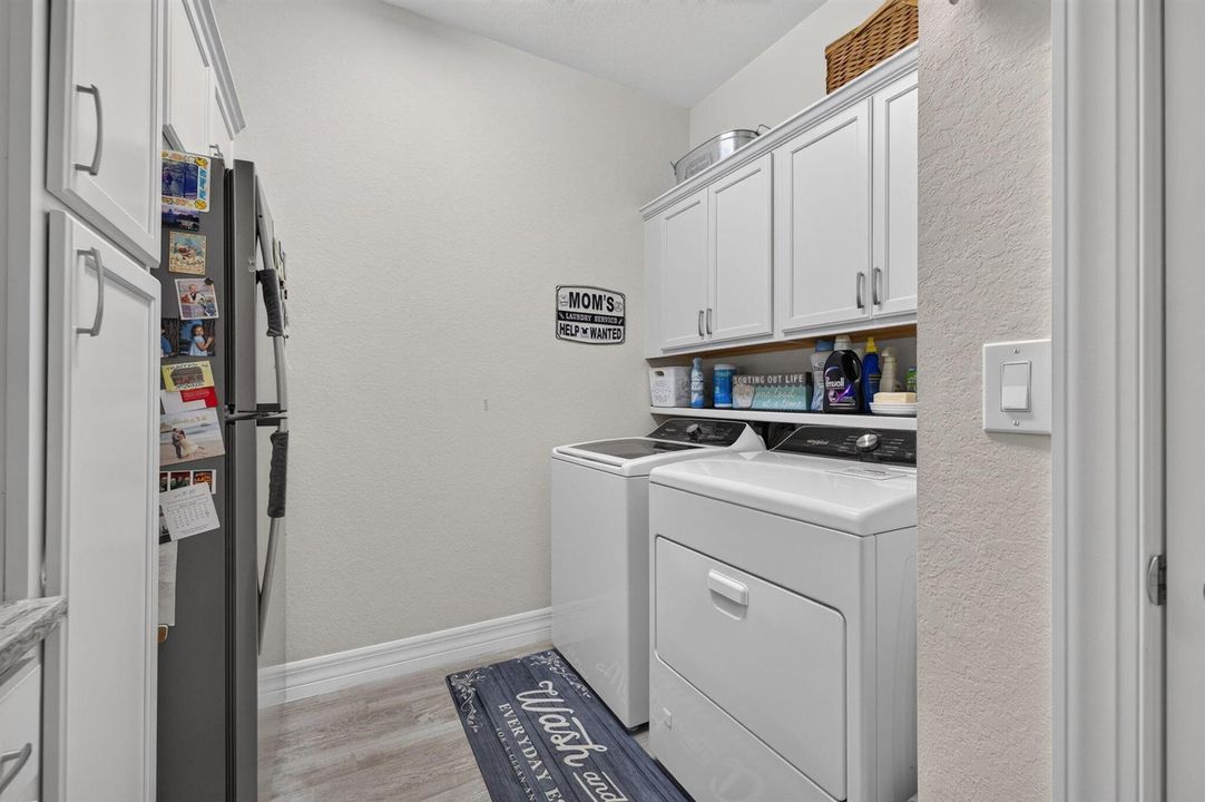 CUSTOM BUILT IN GRANITE BUTLER PANTRY