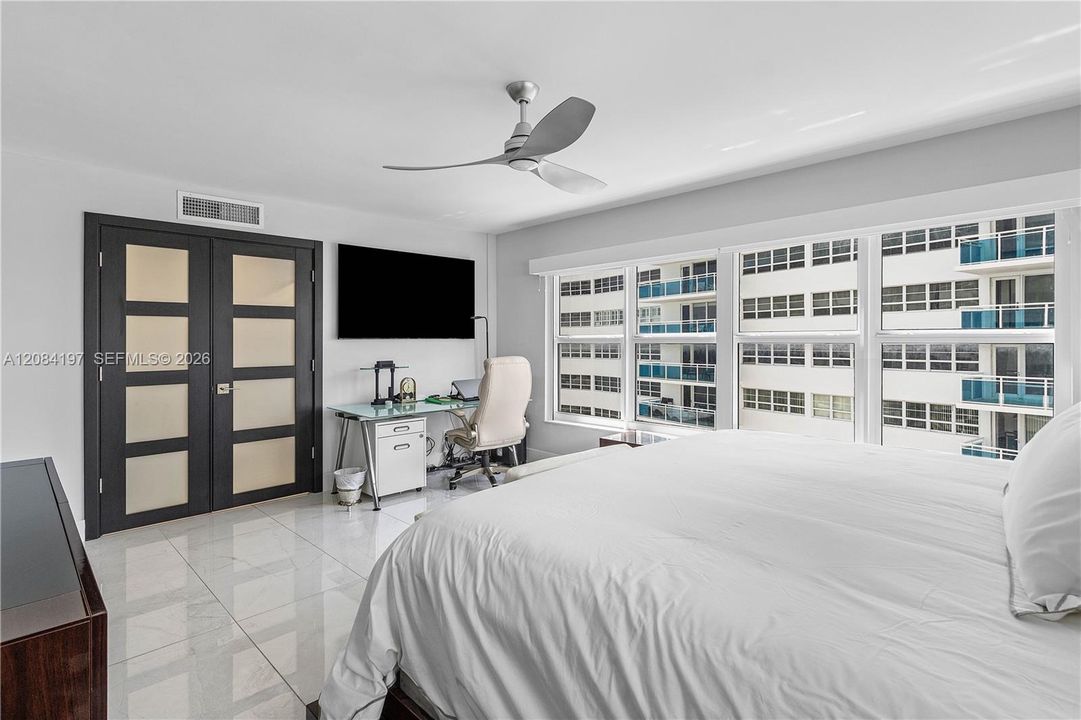 Oversized Primary Bedroom with Electric Blackout Shades and Solar Shades