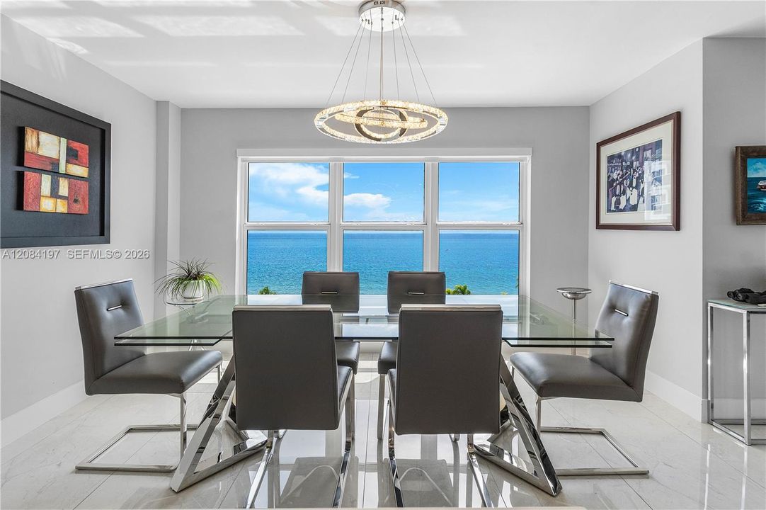 Very Spacious (table stretches to 130") with crystal lights and electric solar shades