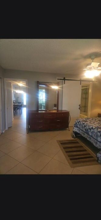 photo of bedroom from patio sliding door